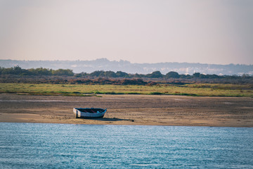 Fishing boat waiting for the tide to rise