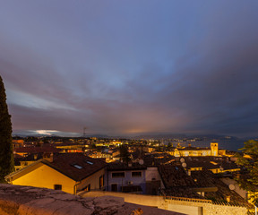 View of Desenzano at night.Skyline of Desenzano del Garda,Italy