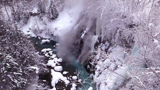 High angle winter view of Whitebeard Falls and Biei River, Japan