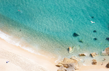 Nazare, Leiria, Portugal - July 01, 2019: Tourists enjoy Nazare Beach, from the viewpoint of Suberco, in the Leiria District, in Portugal.