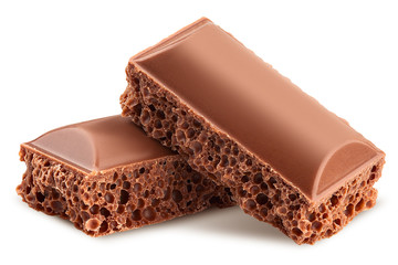 porous chocolate pieces, isolated on white background, clipping path, full depth of field