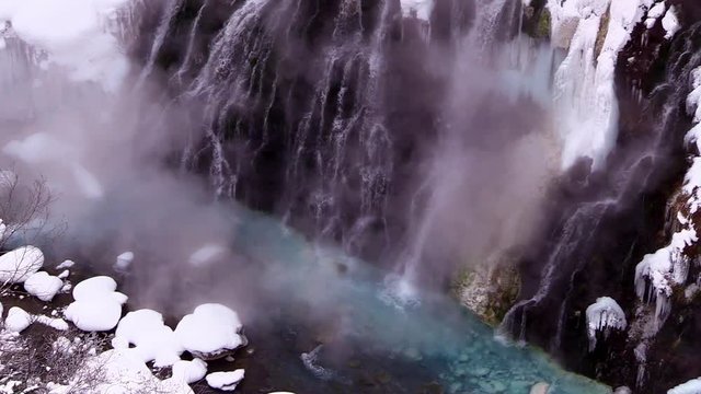 High angle winter view of Whitebeard Falls and Biei River, Japan