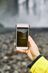 Beautiful scenery of the majestic Skogafoss Waterfall in countryside of Iceland in summer. 
