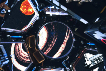 Obraz premium View of space shuttle and Sun of Solar system near black hole from space station. Outer space. Elements of this image furnished by NASA