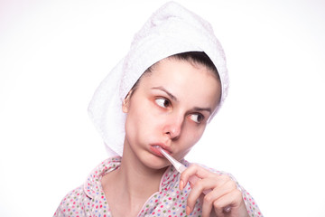 beautiful girl brushing her teeth