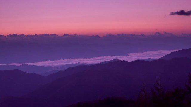 Southern Alps in clouds at sunrise, Japan