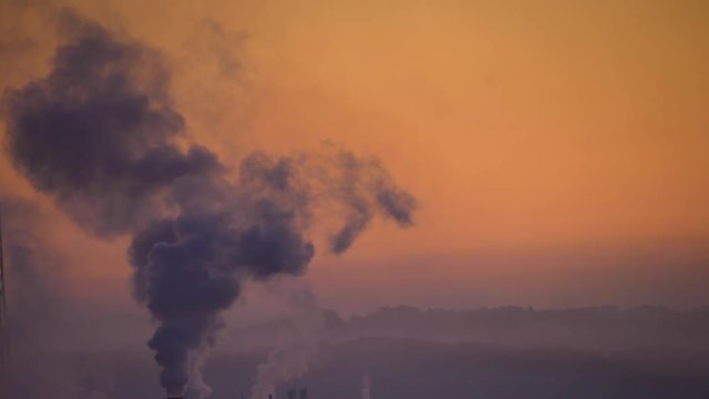 Lockdown shot of smoke coming out of chimney, Iwaki, Fukushima