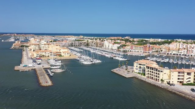 Aerial view of Port Leucate with mediterranean sea in background sunny day France Aude occitanie