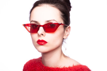young woman in red sunglasses, red lipstick