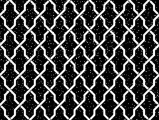 Fototapeta premium Seamless black and white grunge vintage interlocking Moroccan outline pattern vector