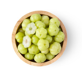 star gooseberry in wood bowl isolated on white background. top view