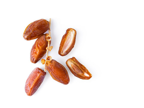 dried date palm isolated on white background. top view