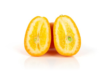 Group of one whole two halves of fresh orange kumquat isolated on white background