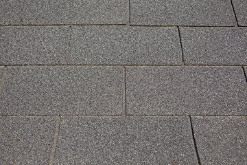 Grey roofing tile face on