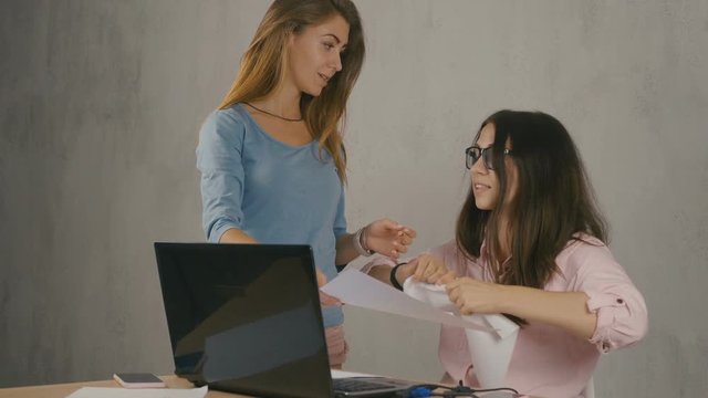 Two angry women arguing at office, quarrel between friends, misunderstanding