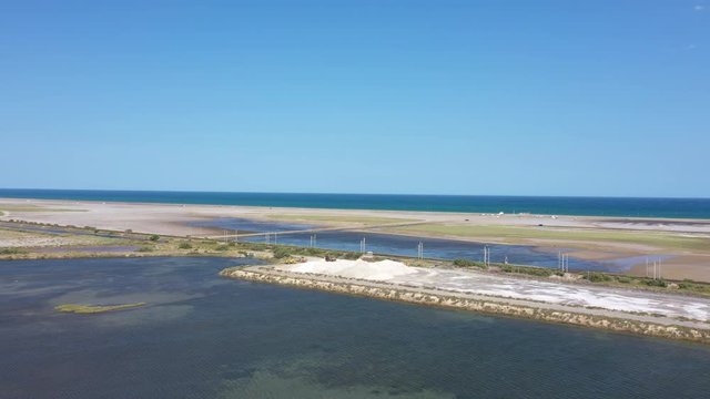 Big salt pile Port la Nouvelle salin de Palme aerial shot Aude Occitanie France 