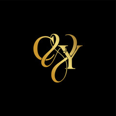 Initial letter C & Y CY luxury art vector mark logo, gold color on black background.