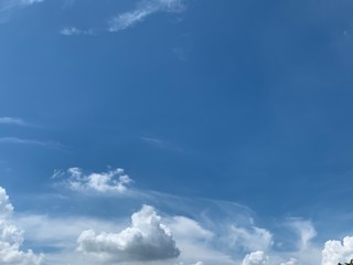 Beautiful white clouds with blue sky.Color shade gradient from white to blue for background wallpaper. 