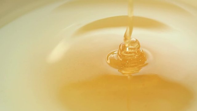 Close up of pouring honey