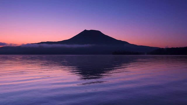 Lake Akan and Mount Akan at purple dawn