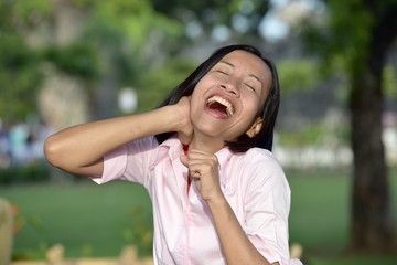 Naklejka premium A Filipina Female Laughing