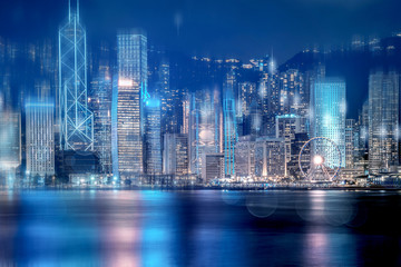 Hong Kong cityscape at night. View From Victoria Harbour.