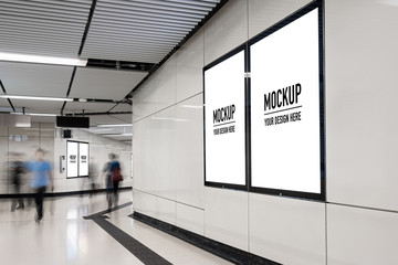 Blank billboard located in underground hall or subway for advertising, mockup concept, Low light...