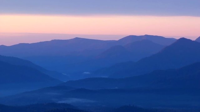 Zoom shot of mountain range at dawn, Kamishihoro, Hokkaido