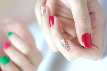 Hand soft and nail of a beautiful woman on colorful background .Beauty and fashion cosmetics concept