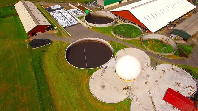 Aerial view to sewage treatment plant. Grey water recycling. Waste management theme. Ecology and environment in European Union.