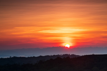 Fototapeta na wymiar Beautiful sunrise in the Phu Lang ka national park, Nakhonphanom province, Thailand.