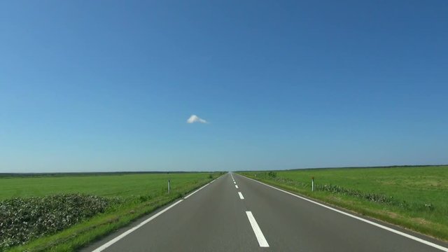POV shot of empty road in rural area, Sarumo, Hokkaido
