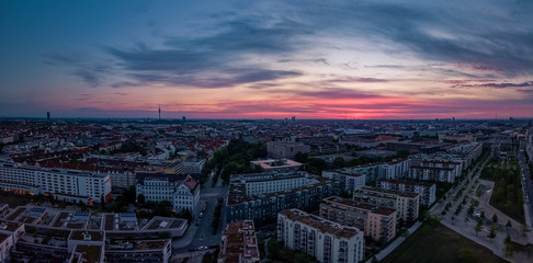 Munich city panorama at sunrise made by a drone to catch the beautiful city as a lovely panorama.