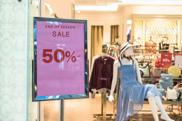 sale up to 70 percent banner at the clothing and shoe store