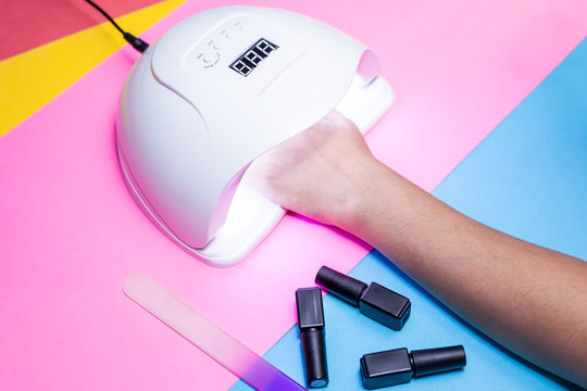 Manicure procedure. Woman Nail Polish. Shellac finger nails