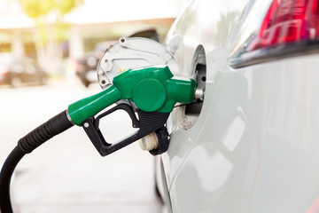 Refill and filling Oil Gas Fuel at station.Gas station - refueling.To fill the machine with fuel. Car fill with gasoline at a gas station. Gas station pump. 