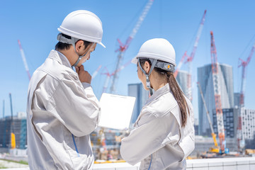 asian engineer worker working in construction site