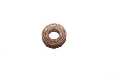 A rusty metal oxidation on a bearing.