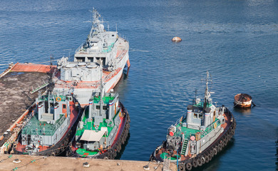 Tugboats and Military ships in Yuzhnaya Bay