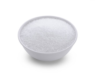 monosodium glutamate in wood bowl on white background
