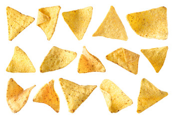 Set of delicious Mexican nachos chips on white background, top view