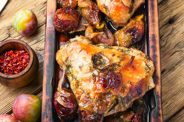 Roasted chicken stuffed with plum