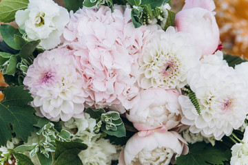 Wedding asymmetric bouquet of eustoma, peonies, dahlias, hydrangeas.
