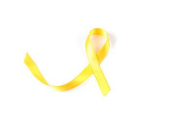 Yellow awareness ribbon isolated on white background