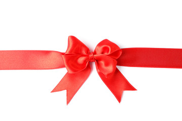 Red ribbon with bow isolated on white background. Gift concept