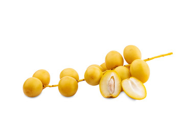 yellow date palm fruit on white background