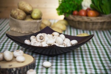 Fresh champignon mushroom vegetable in the kitchen - fresh mushroom vegetable cooking concept