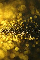 gold glitter abstract background with bokeh defocused lights. Phone wallpaper. gold shining bokeh on black background.Christmas, New Year background.