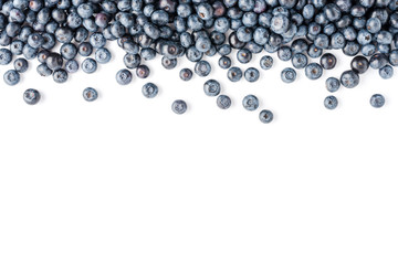 Delicious blueberries on white background with copyspace. Top view