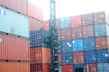 Container loading in cargo ships with industrial cranes Container in import and export business logistics company Industrial and transportation concepts